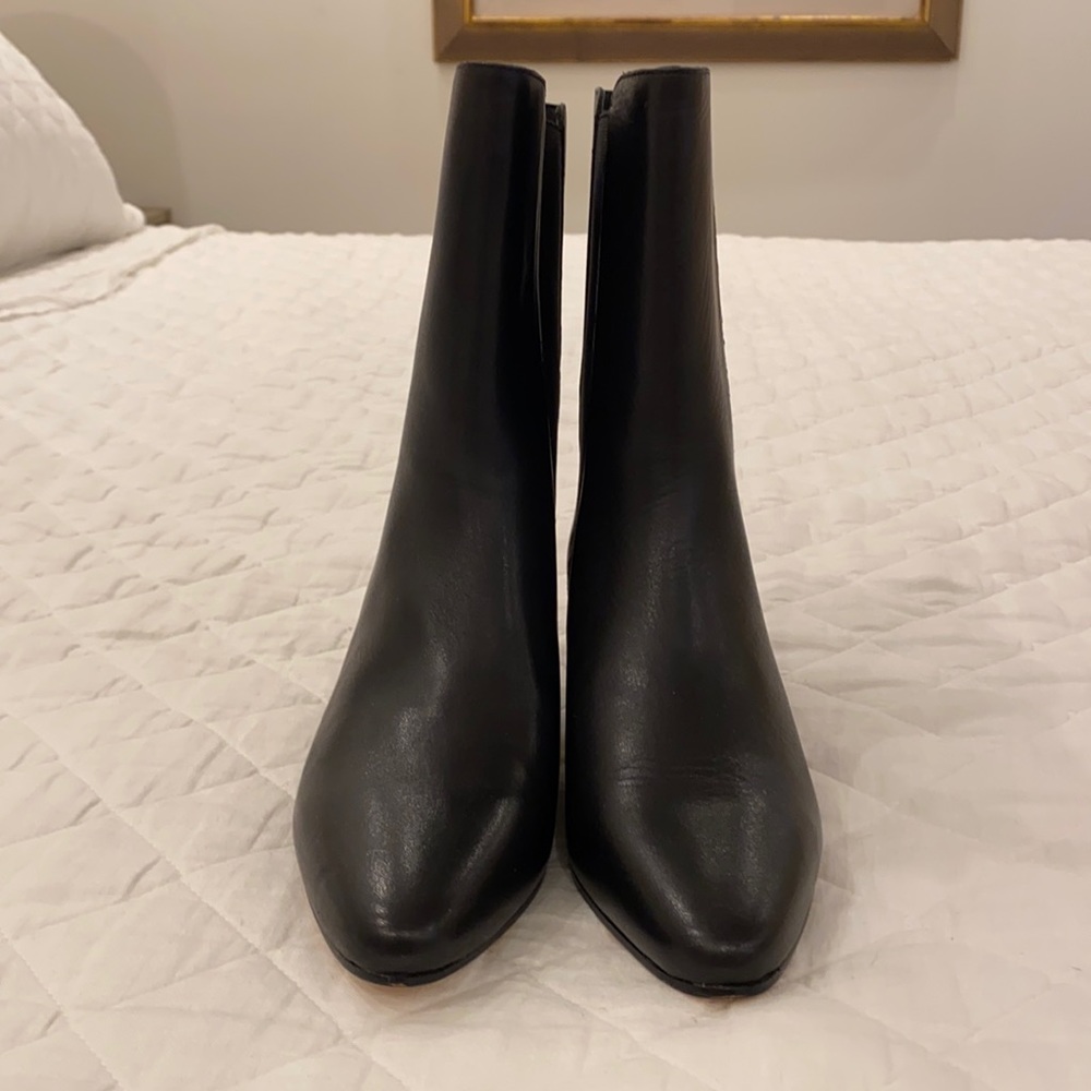 J Crew black leather high shaft stacked heel boots.  Size 6 never been worn